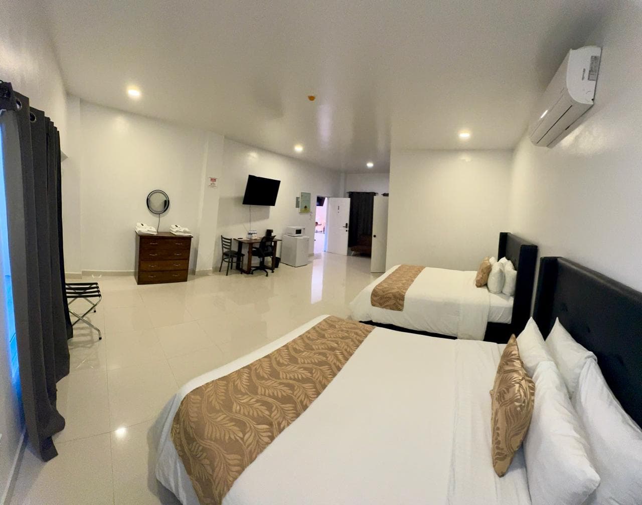 two queen bed with amenities