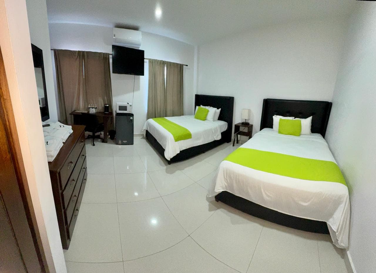 two queen bed with amenities